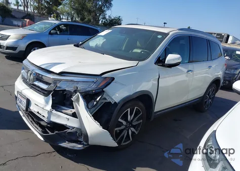 2019 Honda Pilot Touring from USA, damaged, VIN 5FNYF5H62KB000285